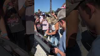 Lindsay Bercosky signing a tail gate with an angle grinder automobile [upl. by Krahmer]