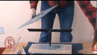 Cutting a hole in slate to match a vent pipe [upl. by Aitnas]