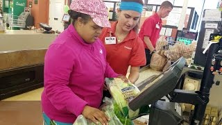 Cashier Helps Autistic Woman Scan Her Shopping [upl. by Ellevehs]