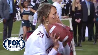 Girl wins 100000 throwing football with two hands [upl. by Yelena]