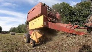 Properly Unrolling a Net Wrap Accident on New Holland 848 Round Baler [upl. by Elfie]