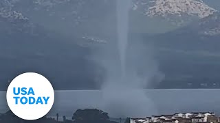 Towering waterspout twists on Turkeys coastline  USA TODAY [upl. by Lenahs]