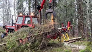 Köp Traktor Volvo BM 650 med stegmatare  kran på Klaravik [upl. by Htinek]