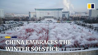 Northeast Chinese hurl hot water into the icecold air to celebrate winter solstice [upl. by Enrobso]