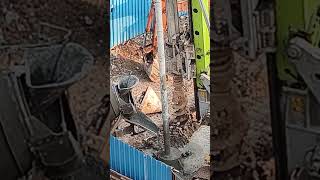 Vibrator helping settling concrete construction foundation megamachine [upl. by Drexler]