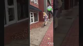 Guy on a scooter dressed as a horse hits a parking meter scootertricks funny fail [upl. by Stanzel113]