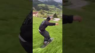 Guy Snowboards Down Giant Grass Mountainside In Switzerland and It’s Amazing [upl. by Cookie]