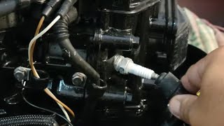 How to change spark plugs on small outboards [upl. by Aihsei]