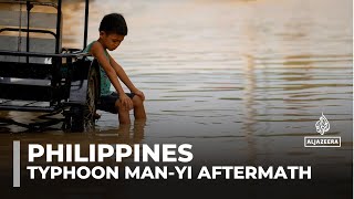 Philippines cleans up as Super Typhoon Manyi leaves deadly trail [upl. by Atnahsal69]