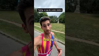 How to take a water cup at a water station while running a race running [upl. by Linell918]