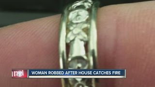 Woman robbed after her home catches fire [upl. by Raouf]