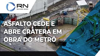 Asfalto cede e abre cratera ao lado de obra de metrô em SP [upl. by Rehportsirhc]