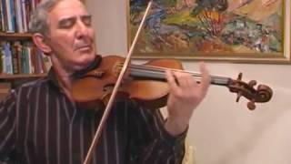 Michail Kazinik tries out a violin made in 1741 by Guarneri [upl. by Gustave]