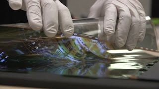 A closer look at LGs crazy rollable display — CES 2016 [upl. by Aerdnahc]