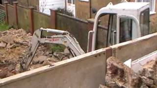 Takeuchi TB016 Loading Lorry with Rubble [upl. by Ahel]