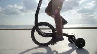 Halfbike II is a pedalpowered vehicle designed to improve the riders balance [upl. by Aisatnaf]