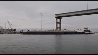 Vessel sails through Key Bridge collapse site marking big step [upl. by Ailhad]