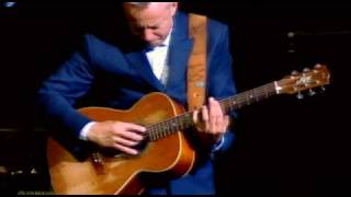 Tommy Emmanuel quotSomewhere Over the Rainbowquot  Summer NAMM 2009 [upl. by Bolte977]