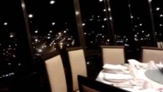 View of Singapore City Skyline from Prima Tower Revolving Restaurant Singapore  2bearbearcom [upl. by Nehtan279]