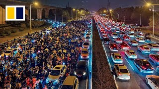 Chinese cycling craze blocks ancient city streets [upl. by Nelleeus]