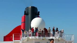 The QM2 sounds its horn as it leaves Southampton to start its world cruise [upl. by Ahras]