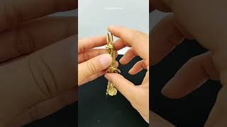 Making a Brass Wire Keychain by Hand handmadeart brasswire diykeychain wirebending customcraft [upl. by Aloap]