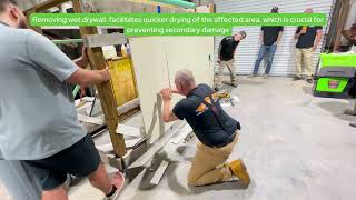 SERVPRO Technicians Demonstrate Drywall Removal in a Water Damage Restoration Scenario [upl. by Milzie]