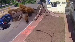 Underground water pipe explosion destroys road in Ukraine [upl. by Yrok220]