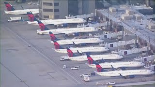 Headaches at HartsfieldJackson Atlanta Airport after flights halted [upl. by Harias]