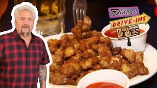 Guy Fieri Eats Chicken GIZZARDS in Michigan  Diners DriveIns and Dives  Food Network [upl. by Quartus109]