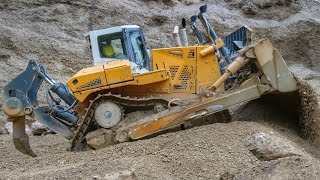 Prototype Liebherr PR776 dozer pushing boulders and gravel [upl. by Wadell]