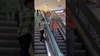 Cheeks pulling prank on escalator 😍 shorts [upl. by Panayiotis]