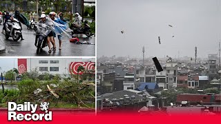 Vietnam orders evacuations and closes airports as Typhoon Yagi makes landfall [upl. by Laing305]