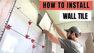 How to Install Tile on the Bathroom Wall StepbyStep [upl. by Harpp]