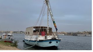 Viewing traditional sailboats in river Nile in Egypt Authentic Lateen rigged craft [upl. by Bilek]