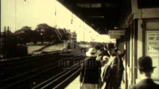 1930s London railways Commuters and steam trains Film 34031 [upl. by Iadrahs]