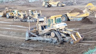 CAT D10N Dozers and 651E scrapers at work  Massive earth moving [upl. by Henn]