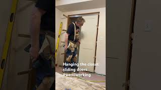 Hanging The Sliding Closet Doors carpenter carpentry youtube viral subscribers [upl. by Eadie758]