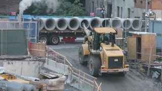 Cat 966H Wheel Loader Unloading Concrete Pipe [upl. by Alcinia]