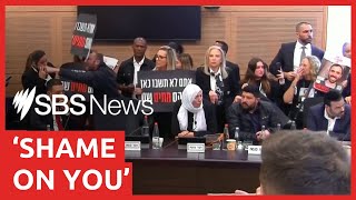 Families of Israeli hostages storm parliamentary meeting to demand action  SBS News [upl. by Asaeret]