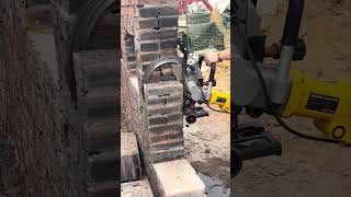 Cutting process of a red brick wall with a handheld trephine saw [upl. by Mathre]