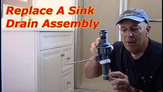 How To Replace A Bathroom Sink Drain Assembly [upl. by Edrahc]