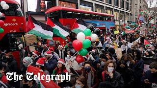 Palestine protesters bring Oxford Street to standstill in Christmas shopping rush [upl. by Laehcimaj]