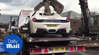 Ferrari crushed after police seize uninsured supercar  Daily Mail [upl. by Leizo]