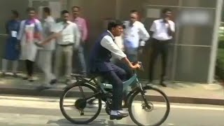 Watch Union Minister Mansukh Mandaviya arrives in Parliament on a bicycle [upl. by Nalla]