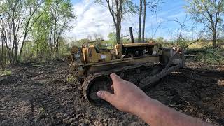 D7 cat moving some brush back from field [upl. by Seidel]