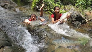 Catch two big fish in waterfall for survival food Big fish roasted with Chili sauce for dinner [upl. by Anauqed]