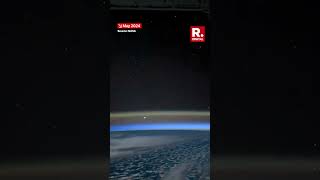 NASA Shares Video Showing Satellites Dancing Across The GreenOrange Predawn Horizon [upl. by Sekyere612]