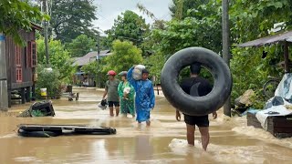 Myanmar residents flee severe floods shelter in a school  AFP [upl. by Sutit]