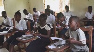 Life After Ebola Children Are Back To School So Are WFP School Meals [upl. by Aivatco]